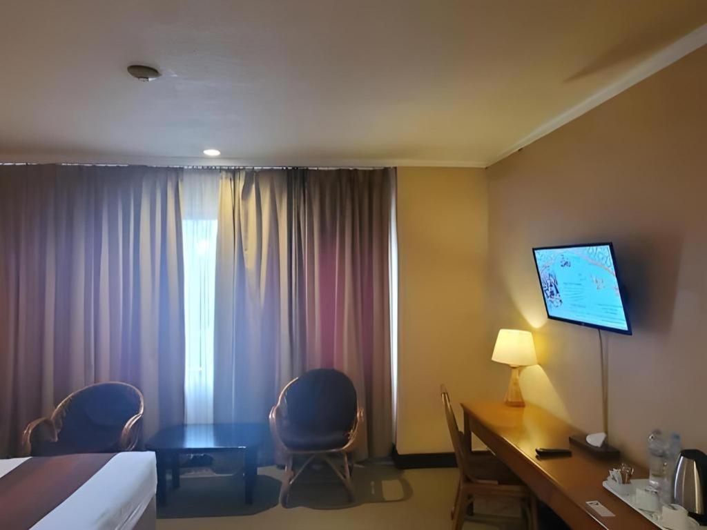 Regent'S Park Hotel Маланг Экстерьер фото