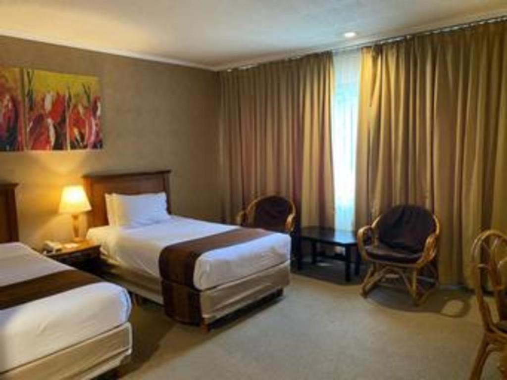 Regent'S Park Hotel Маланг Экстерьер фото