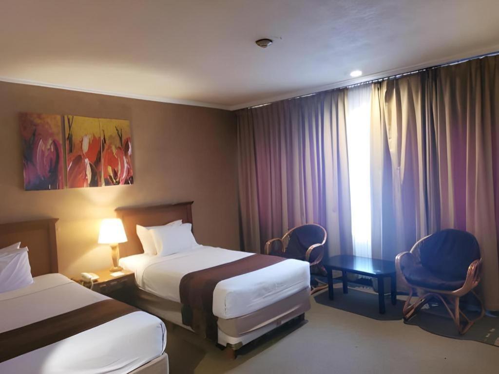 Regent'S Park Hotel Маланг Экстерьер фото